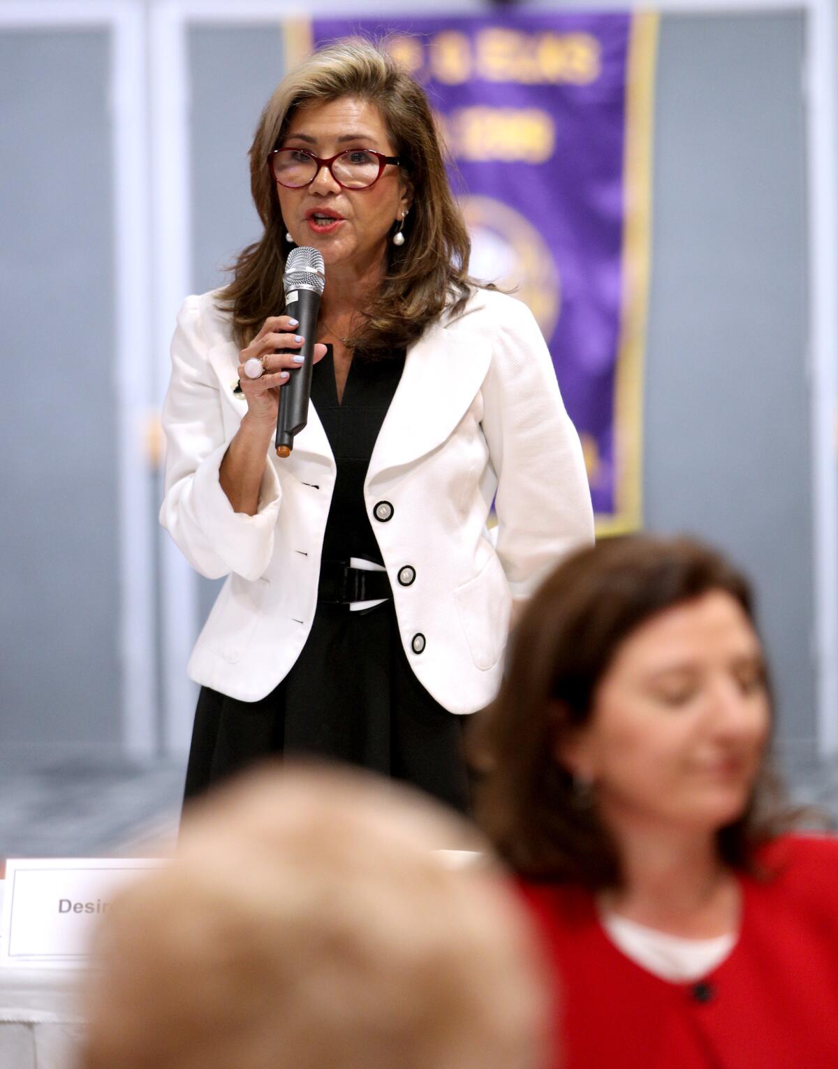 Glendale Community College Board candidate Desiree P. Rabinov speaks to those assembled at the forum.