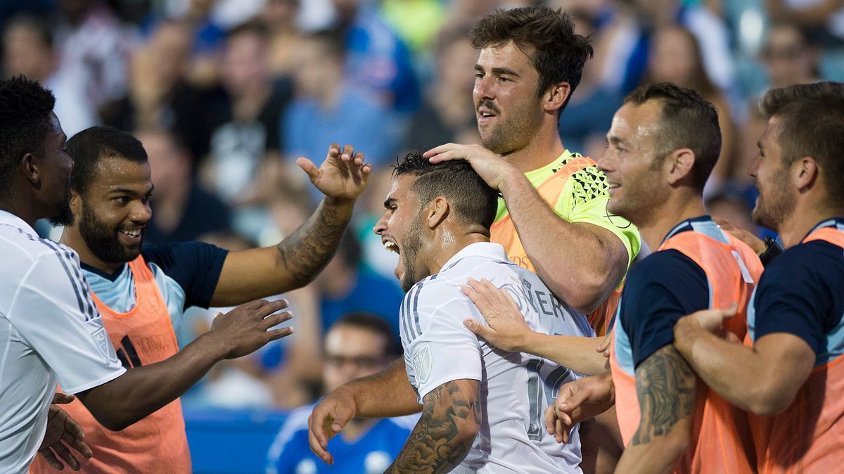 Dom Dwyer, center, celebrates with his Sporting Kansas City teammates after scoring against the Montreal Impact during second half on June 25, 2016.