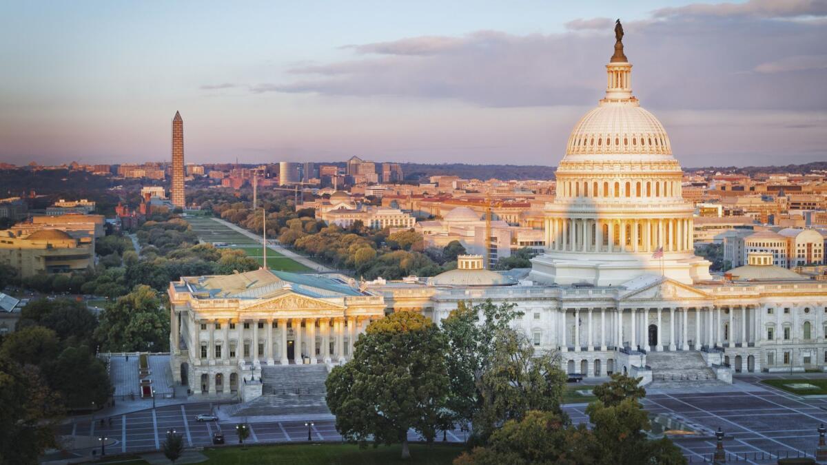 The U.S. Capitol at sunrise as seen from the Library of Congress in Washington, D.C.