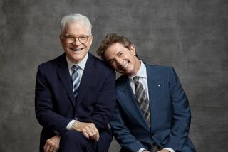 Steve Martin and Martin Short sit next to each other