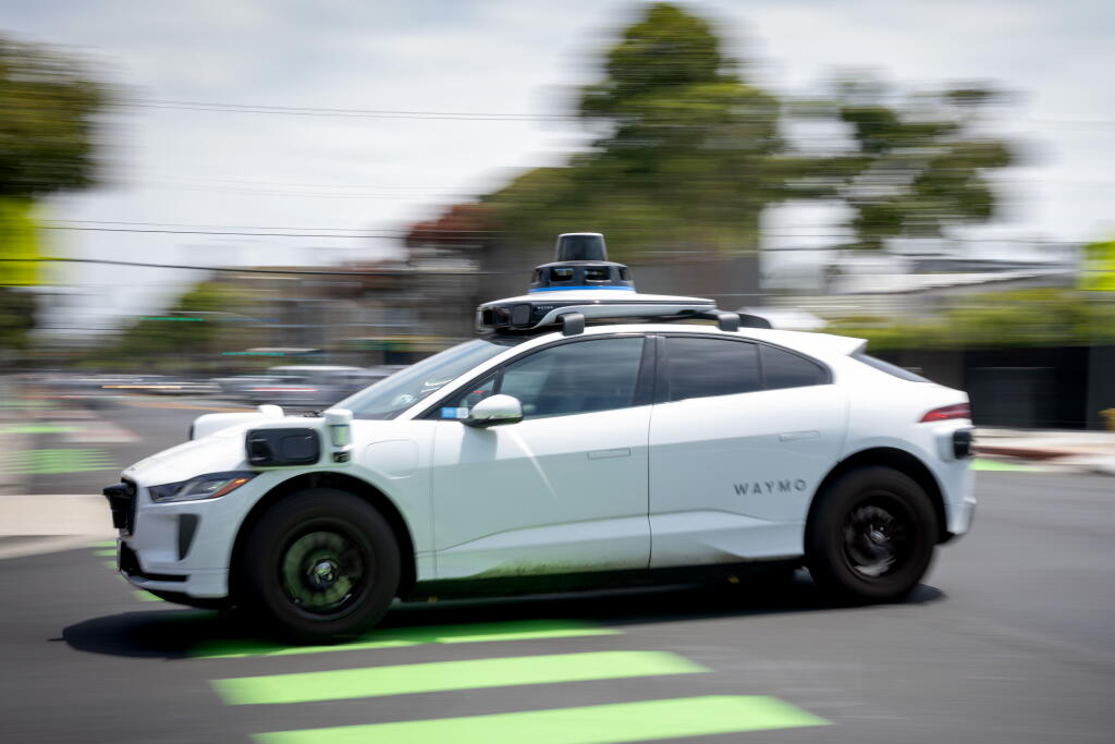 Waymo Image Real Waymo suspends all freeway rides over safety - Los Angeles Times