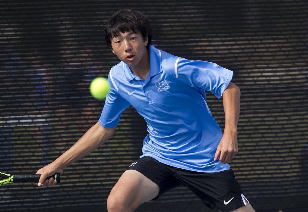 Corona del Mar High's Kyle Pham returns a forehand against Sage Hill.