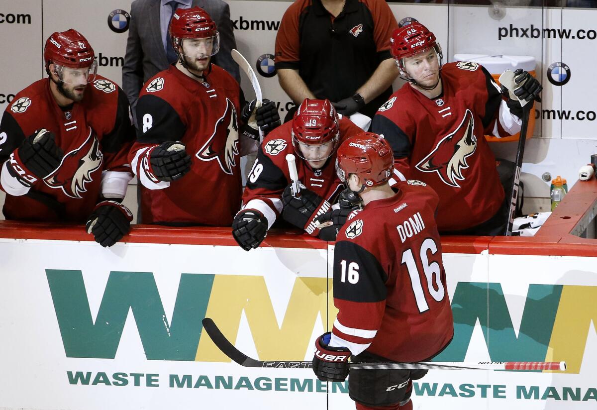 Coyotes rookie forward Max Domi (16) celebrates after scoring on the Oilers during a game on March 22.
