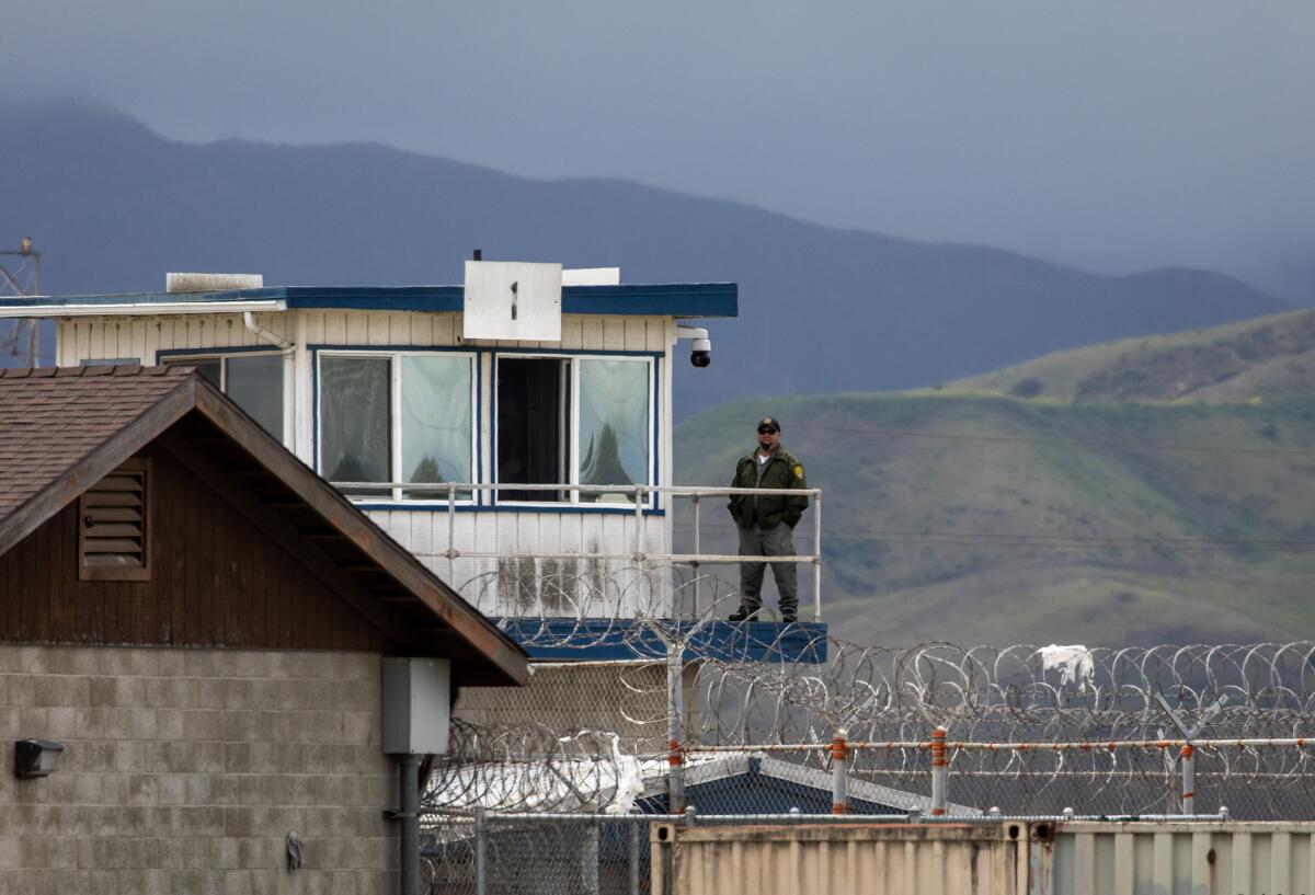 A photograph of a prison guard.