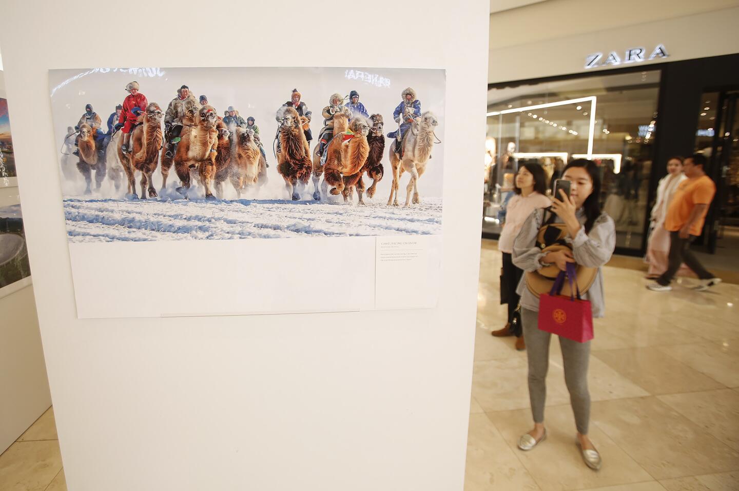 "China Story," a photo exhibit featuring cultural, natural and historic images of China, is part of the Autumn Harvest Festival at South Coast Plaza in Costa Mesa through Sunday.