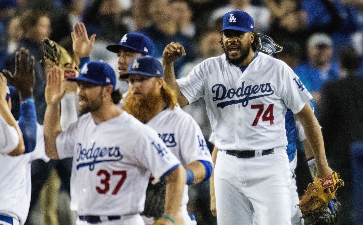 Kenley Jansen reacts with his teammates after winning game 6.