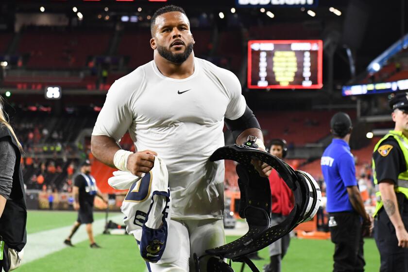 CLEVELAND, OH - SEPTEMBER 22, 2019: Defensive tackle Aaron Donald #99 of the Los Angeles Rams runs off the field after a game against the Cleveland Browns on September 22, 2019 at FirstEnergy Stadium in Cleveland, Ohio. Los Angeles won 20-13. (Photo by: 2019 Nick Cammett/Diamond Images via Getty Images)
