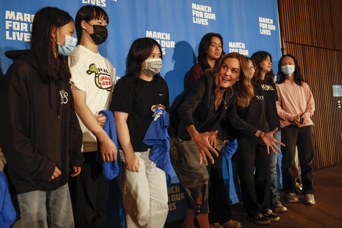  Lexi Reese, a candidate for Dianne Feinstein's Senate seat organizes a photo with students from San Gabriel High School