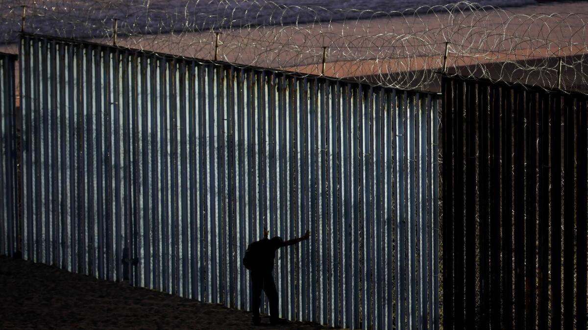 The border wall is fortified with concertina wire at Playas Tijuana along the U.S.-Mexico border in Tijuana.