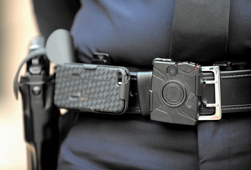 Under new legislation signed by Gov. Jerry Brown, police agencies whose officers wear body cameras will have to follow rules on storing and using the video so it is not mishandled.