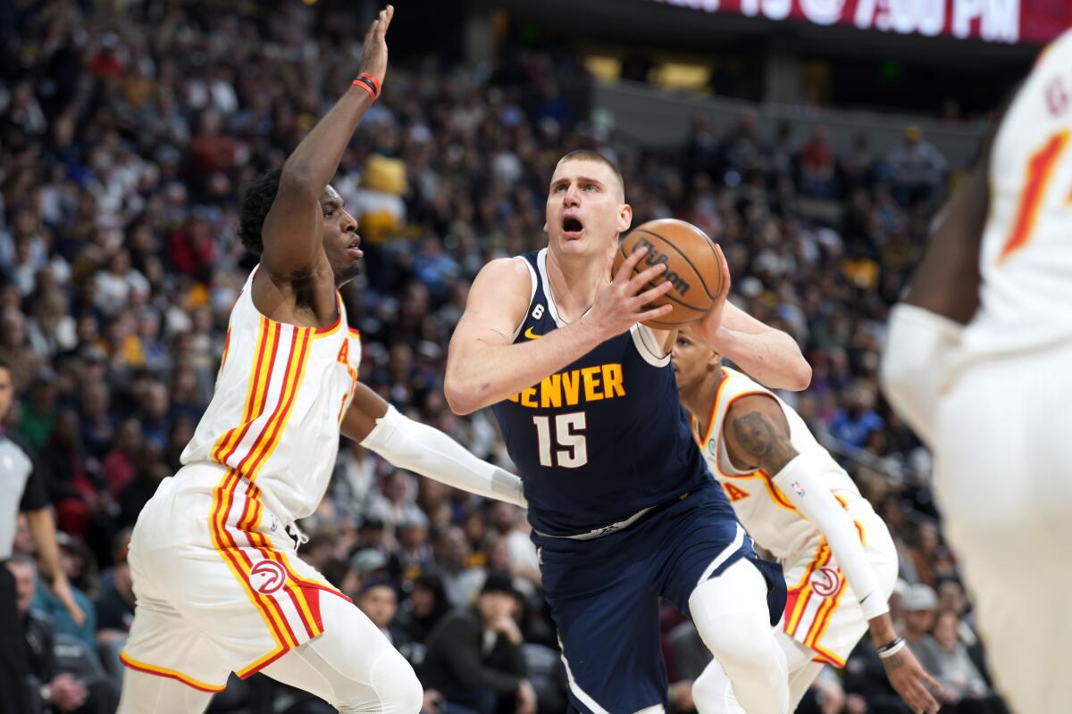 Murray's 31 points, Jokic's triple-double help Nuggets fend off Pacers