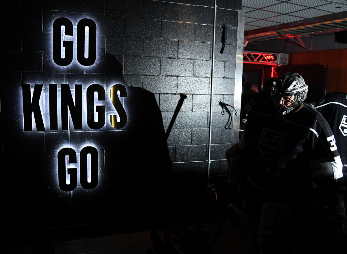 Kings goaltender Jonathan Quick makes his way from the locker room to the ice.