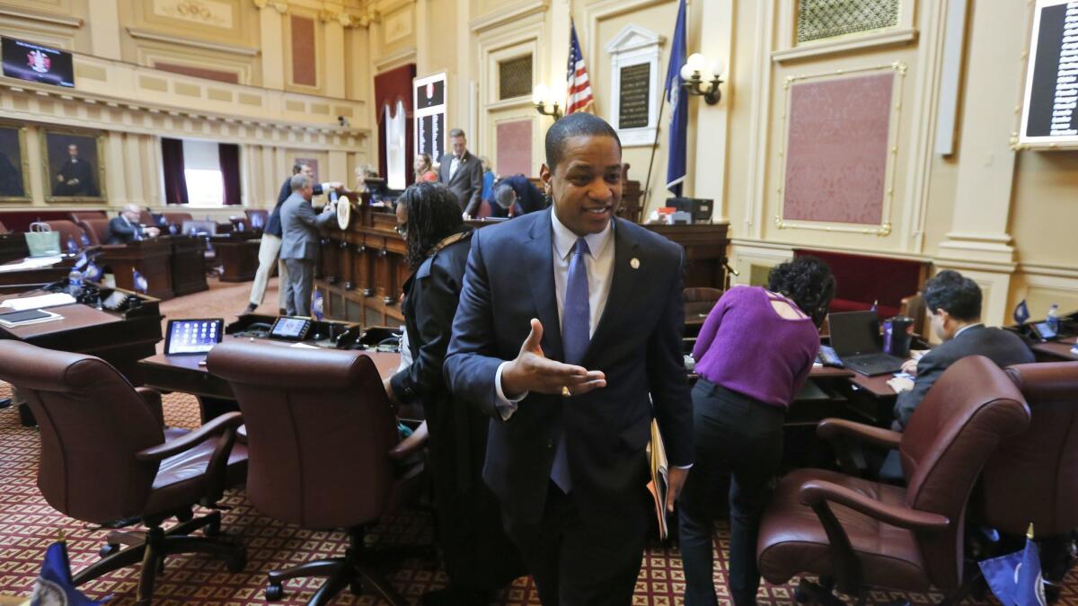 Virginia Lt. Gov. Justin Fairfax exits the floor after the Virginia State Senate adjourned their 2019 session at the Capitol in Richmond, Va., on Sunday.