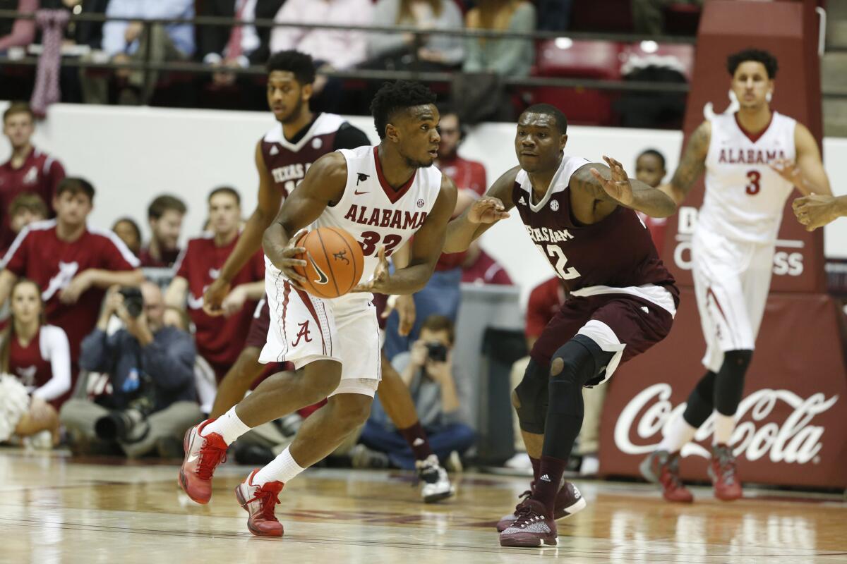 Alabama forward Donta Hall (35) drives the ball toward the basket against Texas A&M during the first half of a game on Feb. 10.