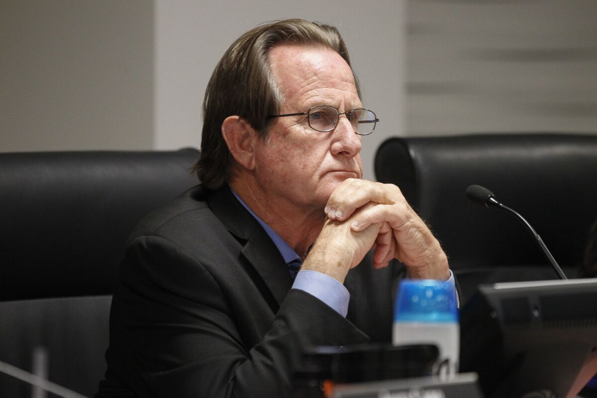 National City Mayor Ron Morrison listens to people speak at a meeting in 2018.
