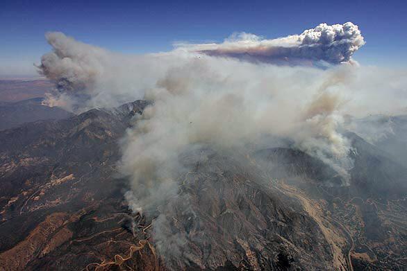 Smoke from the Station fire over the Angeles National Forest as seen from a helicopter.