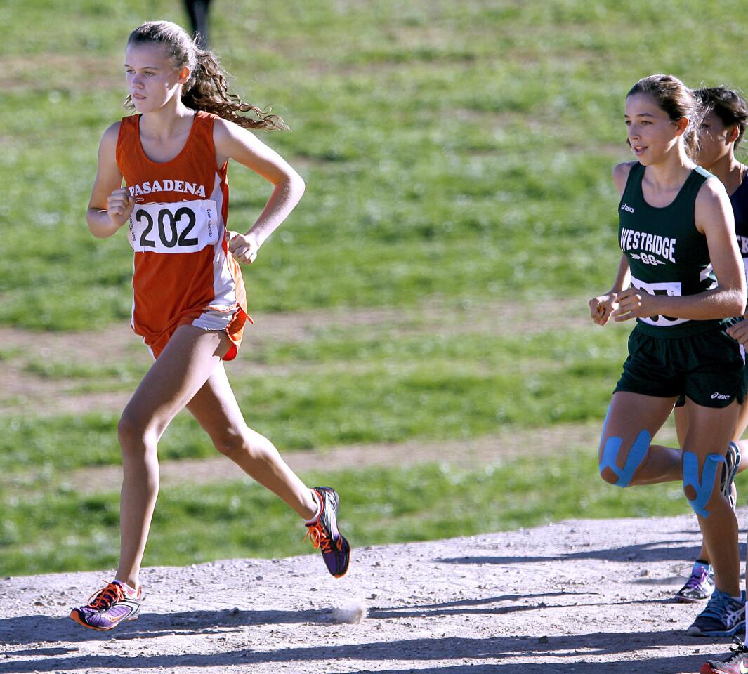 Pasadena Poly's Evan Gancedo, left, kept the competition at bay to win the Prep League Girls Varsity Cross-Country race at Pierce College in Woodland Hills on Saturday, Oct. 27, 2012. The Mayfield Senior School team won the girls league title. Emma Hovanec, who finished second, from Westridge High, is at right.