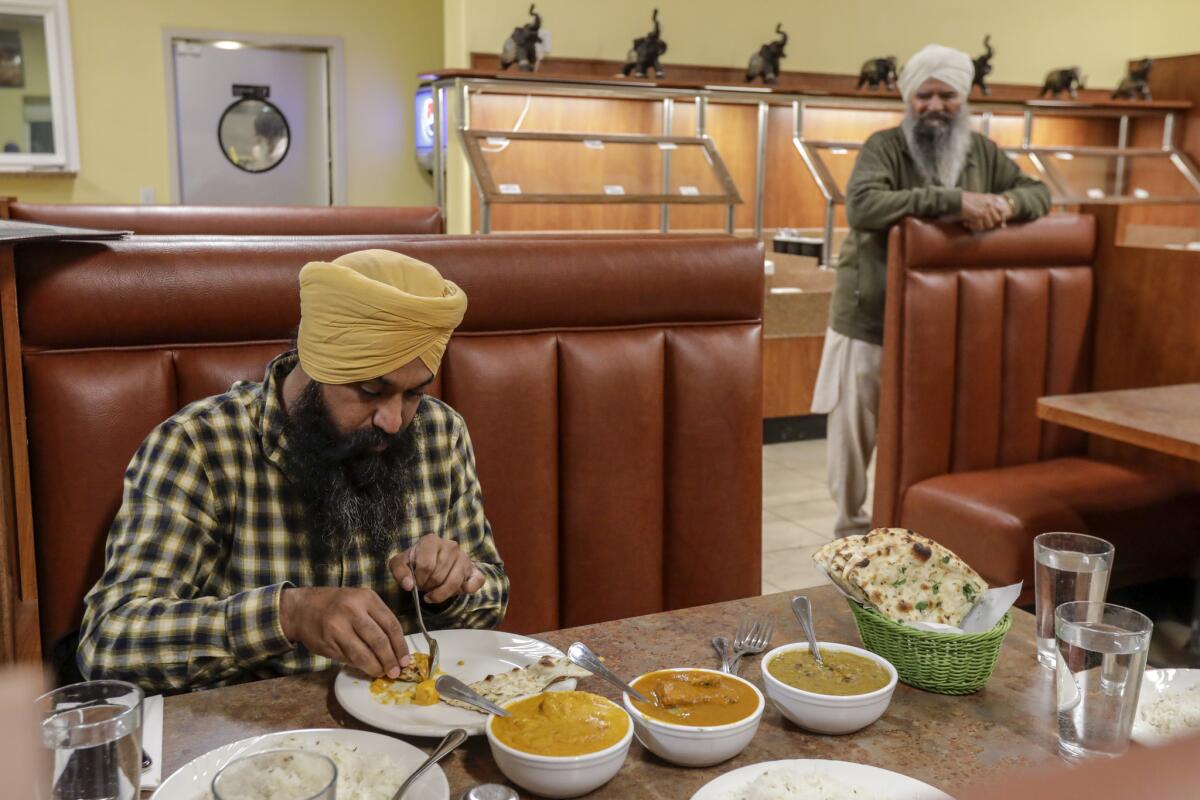 Singh dines at Spicy Bite in Milan, N.M. (Irfan Khan / Los Angeles Times)