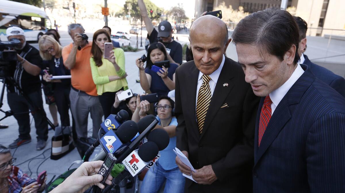 Former Los Angeles County Sheriff Lee Baca, left, with attorney Nathan Hochman last week after he was convicted of orchestrating a scheme to thwart an FBI investigation into inmate mistreatment in the jails he ran and of lying to federal authorities.