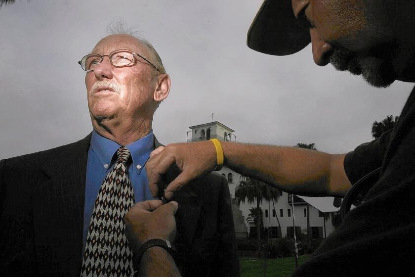 Santa Barbara County Dist. Atty. Tom Sneddon is shown outside the courthouse in 2005 after a Santa Maria jury acquitted pop star Michael Jackson on child molestation charges. Sneddon died Saturday at the age of 73.