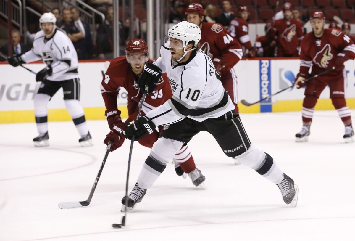 Mike Richards scores against the Arizona Coyotes during the first period of an exhibition game on Monday at Jobing.com Arena in Glendale, Ariz.