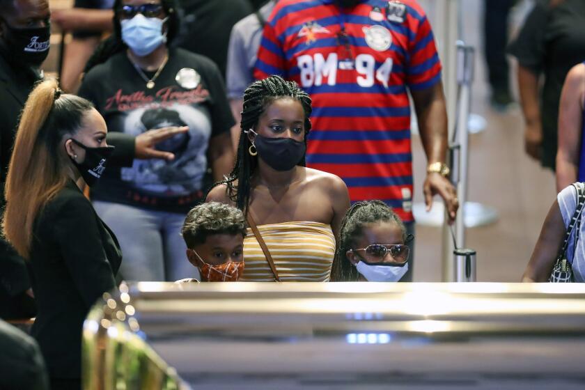 Mourners view the casket of George Floyd during a public visitation Monday, June 8, 2020, at The Fountain of Praise church in Houston. (Godofredo A. Vásquez/Houston Chronicle via AP, Pool)