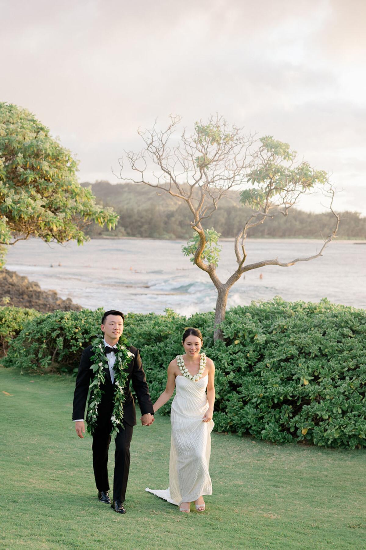 A married couple on the grounds of the Ritz Carlton Turtle Bay.