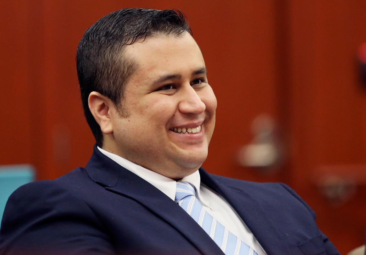 George Zimmerman appears amused during a lighter moment as his defense counsel Mark O'Mara questions potential jurors in Sanford, Fla.