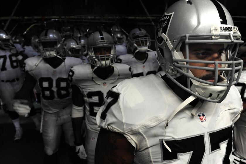 Oakland Raiders tackle Austin Howard prepares to take the field with his teammates before a game against the San Diego Chargers on Oct. 25.