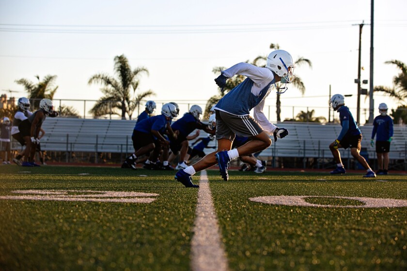 Culver City High's football team goes through a workout on Feb. 26, 2021, the first day teams could resume activities.