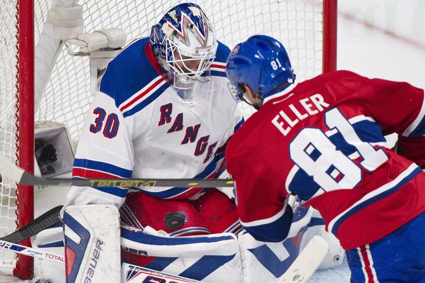 New York Rangers goalie Henrik Lundqvist makes a save on a shot by Montreal Canadiens forward Lars Eller during the second period of the Rangers' 3-1 win in Game 2 of the Eastern Conference finals on Monday.