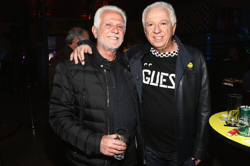 Maurice Marciano (L) and Paul Marciano attend GUESS x J Balvin launch party on February 8, 2019 in Los Angeles