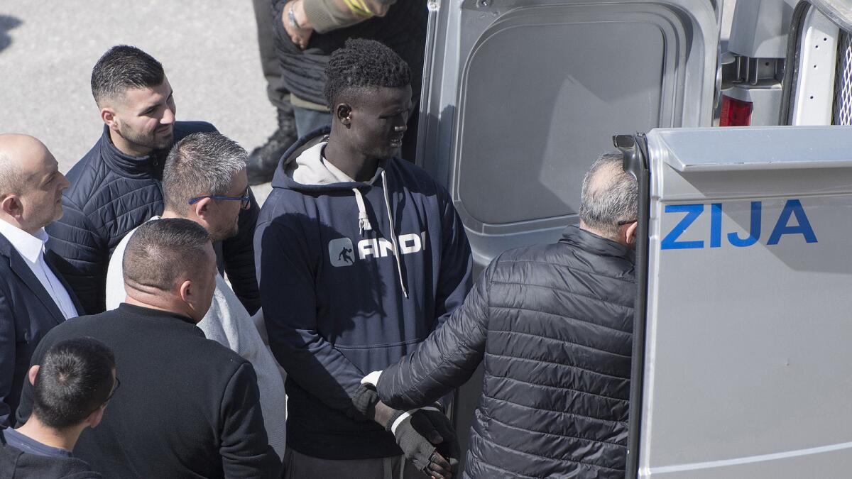 A suspect in the hijacking of the Turkish oil tanker El Hiblu 1 is taken into custody in Valletta, Malta, on March 29.