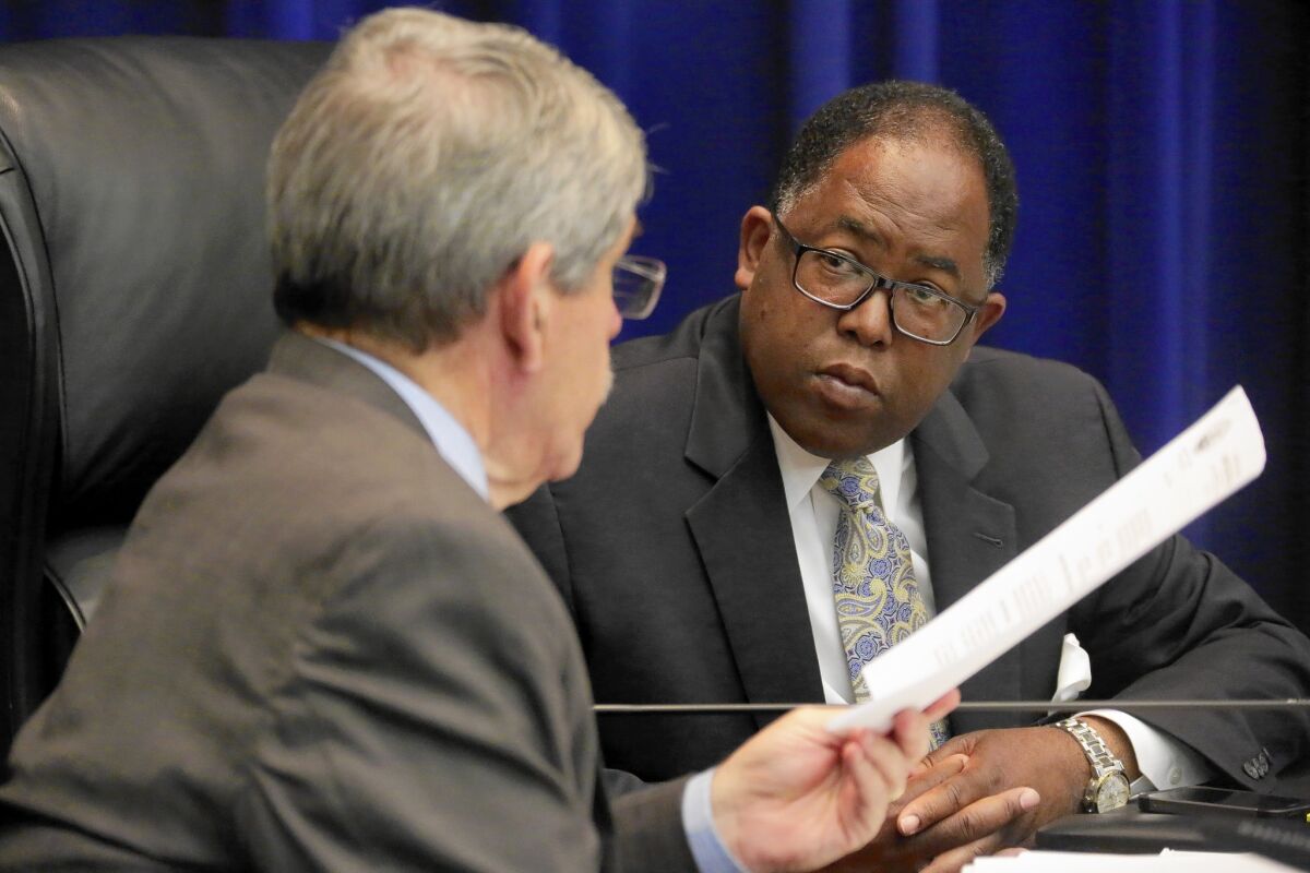 Los Angeles County Supervisor Zev Yaroslavsky, left, voted against a proposal by Supervisor Mark Ridley-Thomas to create a civilian commission for the Sheriff's Department. They are shown at the June 10 board meeting.