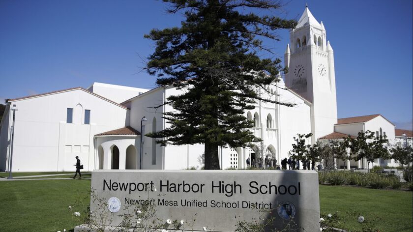 Newport Harbor High School was vandalized by Nazi posters over the weekend, a week after students from Newport Harbor and other local high schools attended an off-campus party where some were photographed giving Nazi salutes around a swastika formed from drinking cups.