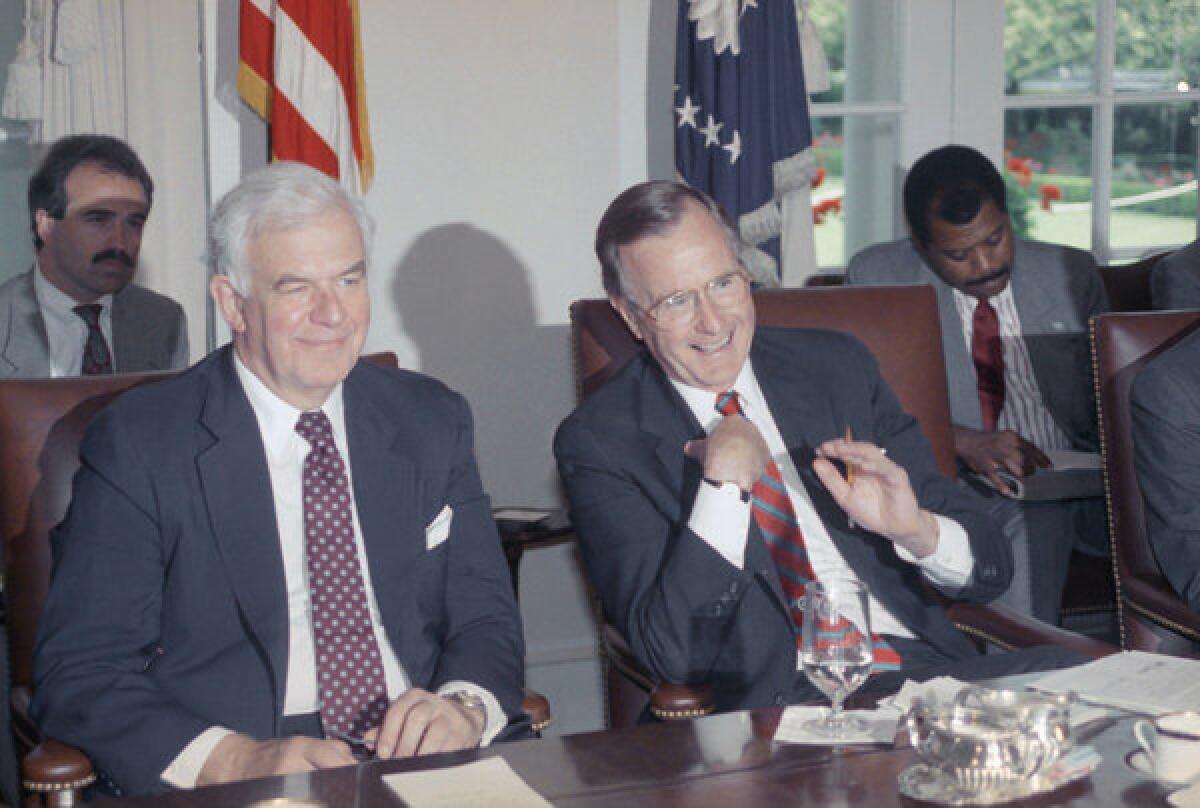 In this 1989 photo, House Speaker Thomas S. Foley (D-Wash.) sits next to President George H.W. Bush during a meeting with the congressional leadership at the White House. Foley died Friday at age 84.