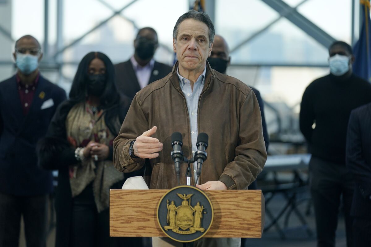 Gov. Andrew Cuomo at a lectern.
