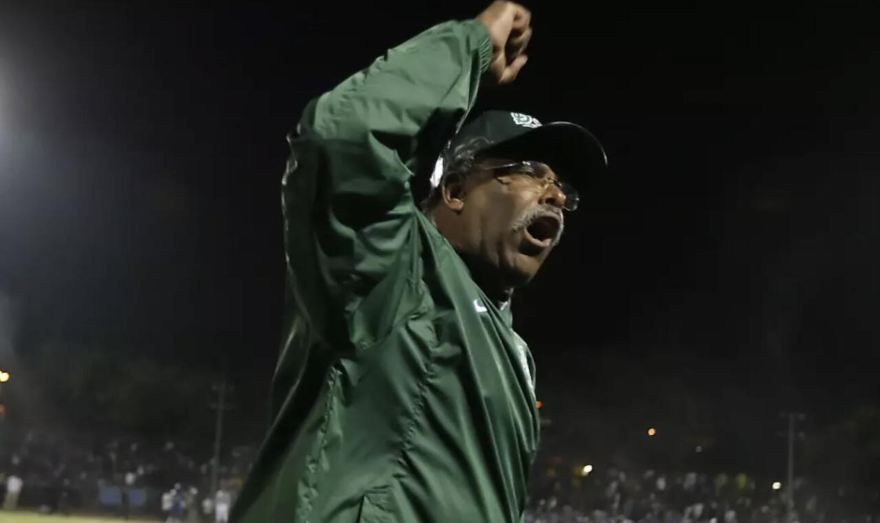 Former Dorsey coach Paul Knox celebrates miracle win in 2001 City championship game at Coliseum.