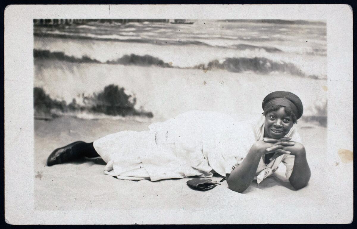  A historical photo of a Black female beachgoer 