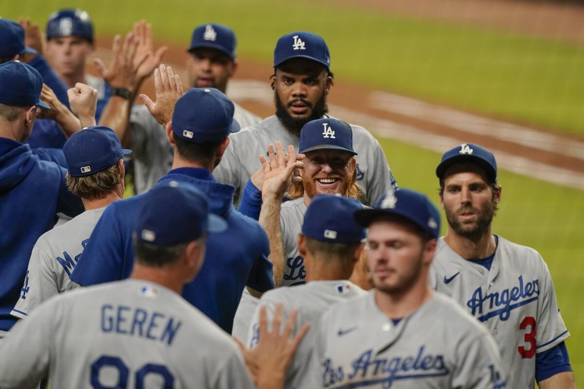 Dodgers third baseman Justin Turner celebrates with his teammates.