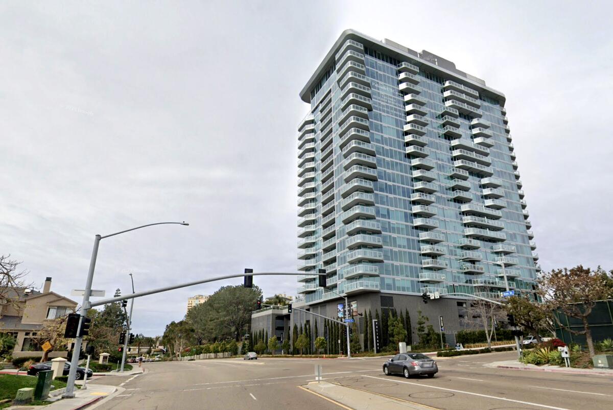 High-rise apartment building where a man died in an apparent parachuting mishap after jumping from a balcony