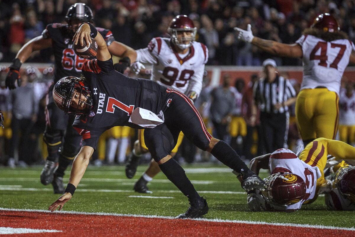 Utah quarterback Cam Rising scores on a two-point conversion run with 48 seconds left against USC on Oct. 15, 2022.