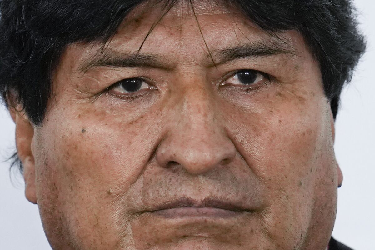 FILE - Bolivia's former president Evo Morales attends attends the presentation of "Operation Rescue", at the Mexican embassy in Buenos Aires, Argentina, Thursday, Nov. 4, 2021. The International Criminal Court's chief prosecutor said Monday, Feb. 14, 2022 he will not launch a full investigation into allegations that former Bolivian President Evo Morales and his supporters committed crimes against humanity by establishing roadblocks that prevented people in one of Latin America’s poorest nations from accessing vital health care during the coronavirus pandemic. (AP Photo/Natacha Pisarenko, file)