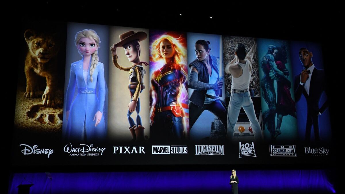 Disney executive Cathleen Taff presents the studio's franchises to theater owners at CinemaCon in Las Vegas.