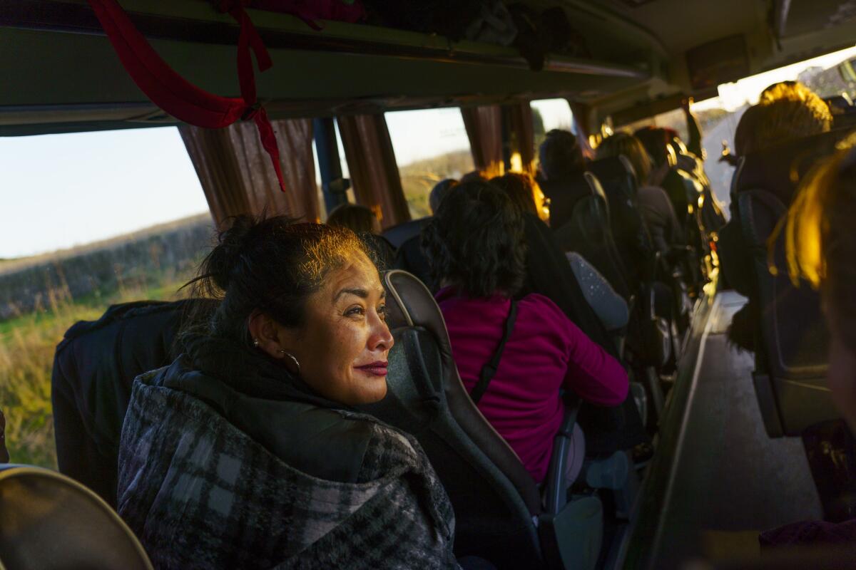 Lesli Orellana on the bus ride to Calzadilla de la Cueza. (Angel Navarrete for Los Angeles Times)