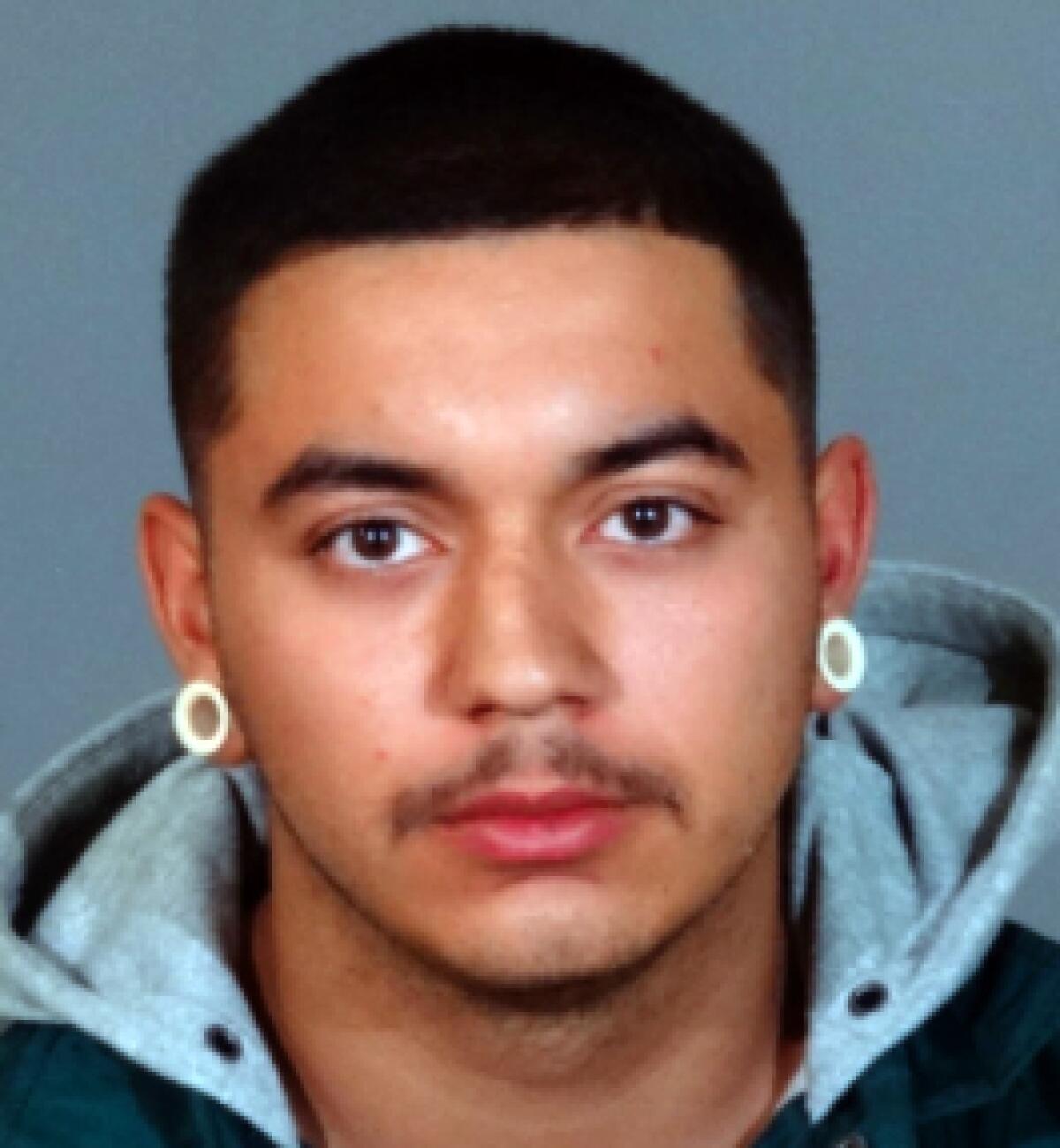 Oscar Palazuelos is being sought as a suspect in the killing of Ismael Zabala on Dec. 20, 2020.