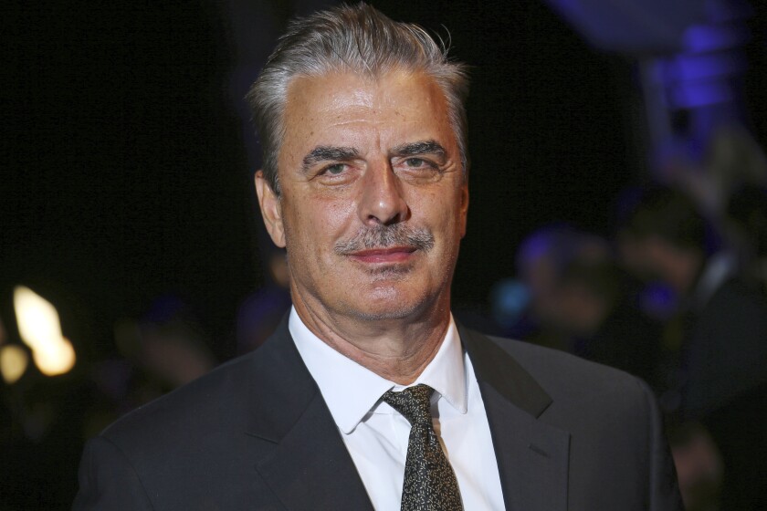 FILE - Actor Chris Noth poses for photographers upon arrival at the British Independent Film Awards in central London, on Dec. 2, 2018. Noth has been accused of sexually assaulting two women in separate encounters that took place in 2004 and 2015, according to a report in The Hollywood Reporter, Thursday, Dec. 16, 2021. Noth, 67, who starred in “Sex and the City” and appears briefly in its newly released sequel, “And Just Like That...,” said in a statement to the Reporter that the encounters were consensual. (Photo by Joel C Ryan/Invision/AP, File)