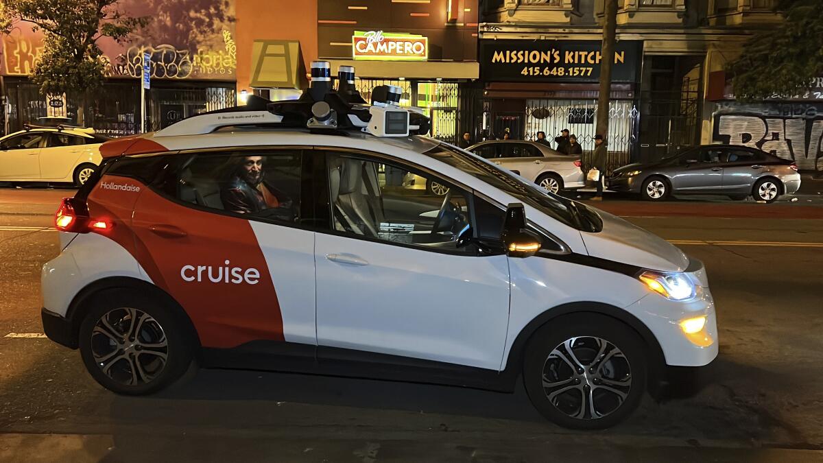 A Cruise driverless taxi in San Francisco's Mission District