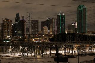 A power station in front of the downtown Dallas skyline during a winter storm on Jan. 25.
