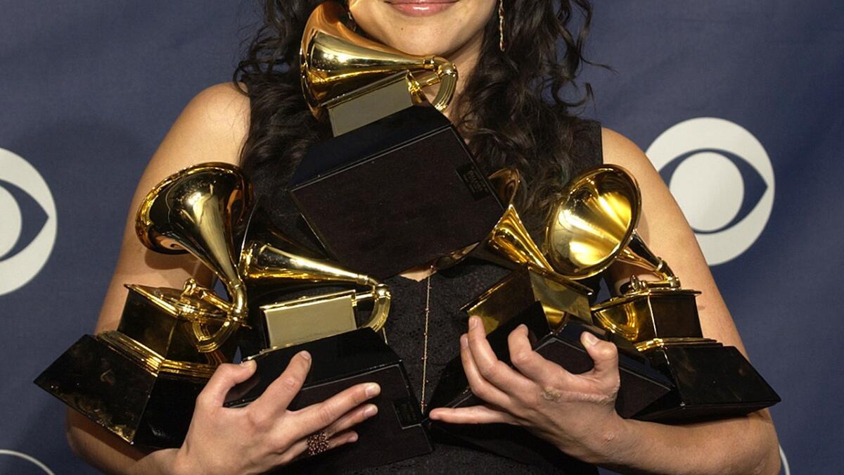 This artist won in every category in which she was nominated, and tied Lauryn Hill and Alicia Keys for most wins by a female artist in a single night. Who is she?